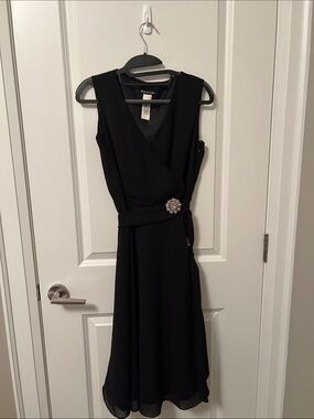 Bahari Black Sleeveless Midi Wrap Dress with Decorative Brooch